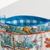 TROUSSE COQUETTE "L'ENFANT AU DAUPHIN" ORANGE – Image 2