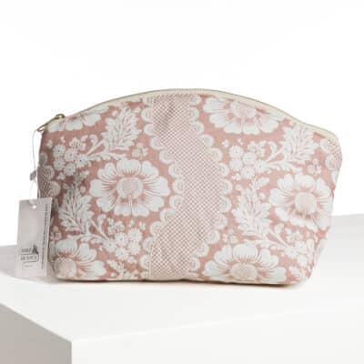 TROUSSE ARRONDIE "FLEURS STYLISEES SUR MONTANTS ONDULANTS" ROSE POUDRE