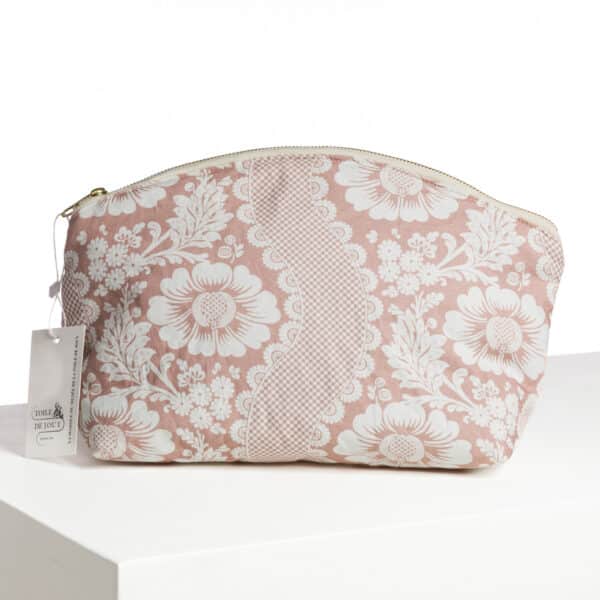 TROUSSE ARRONDIE "FLEURS STYLISEES SUR MONTANTS ONDULANTS" ROSE POUDRE