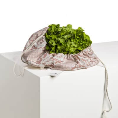 SAC A SALADE "FLEURS STYLISEES SUR MONTANTS ONDULANTS" ROSE POUDRE