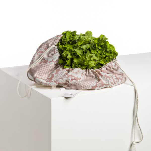 SAC A SALADE "FLEURS STYLISEES SUR MONTANTS ONDULANTS" ROSE POUDRE