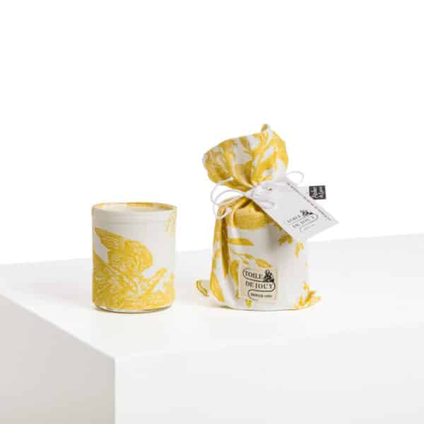 BOUGIE ET SON POCHON "4 PARTIES DU MONDE" JAUNE BOUTON D'OR