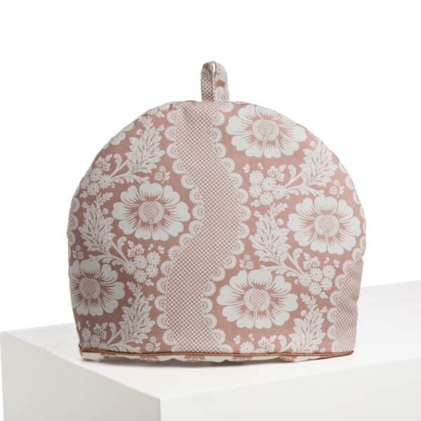 CACHE THEIERE "FLEURS STYLISEES SUR MONTANTS ONDULANTS" ROSE POUDRE