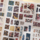 Un assortiment d'échantillons de tissus colorés aux motifs variés, notamment floraux, géométriques et à rayures, disposés en grilles sur de grandes feuilles blanches — idéal pour une découverte lors d'une visite guidée des collections permanentes du musée. - Musée de la Toile de Jouy